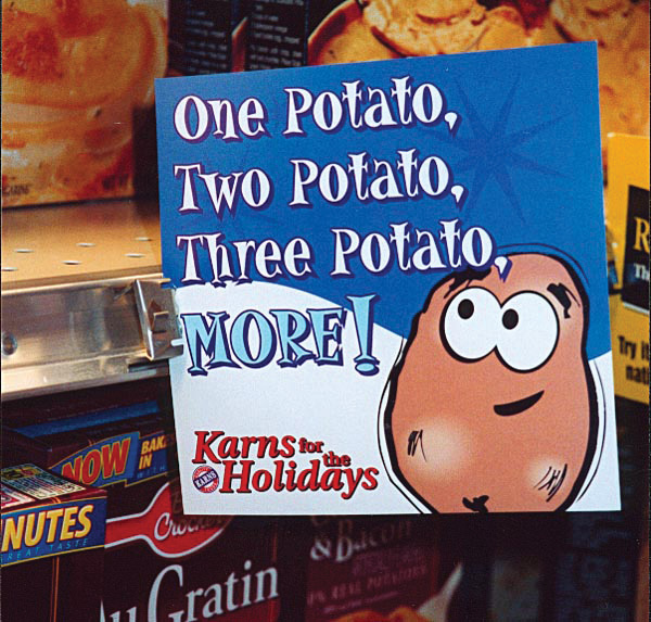 A Karns Foods shelf talker printed in-house by Weber
