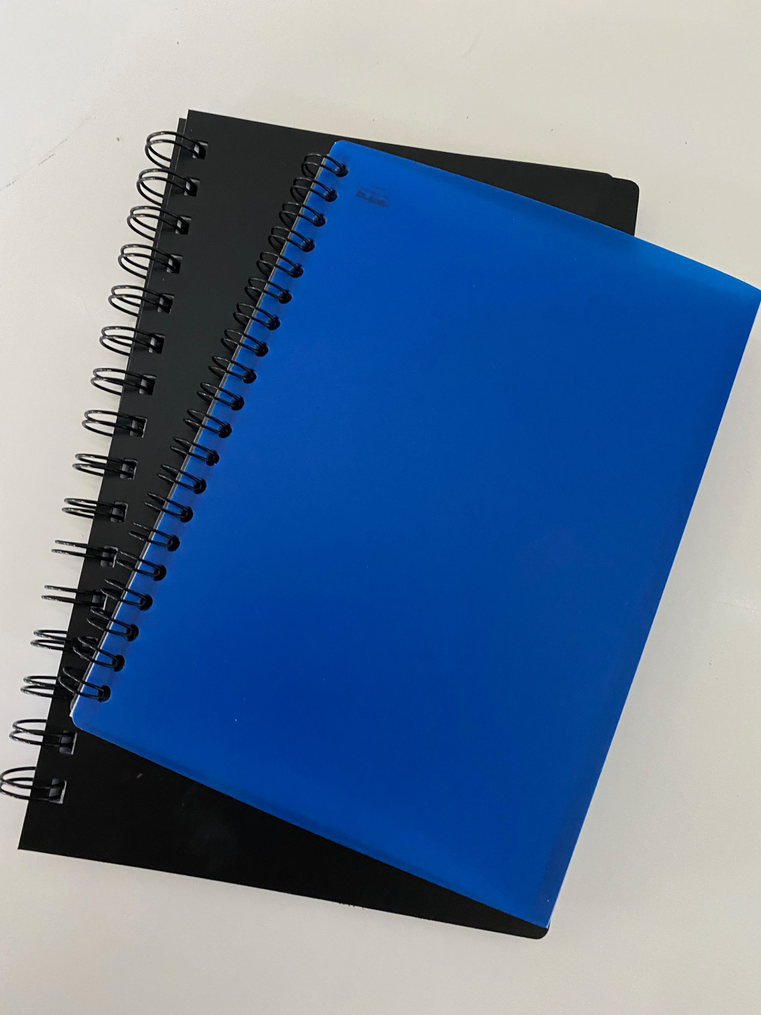 Spiral-bound books and catalogs printed and bound in-house by Weber